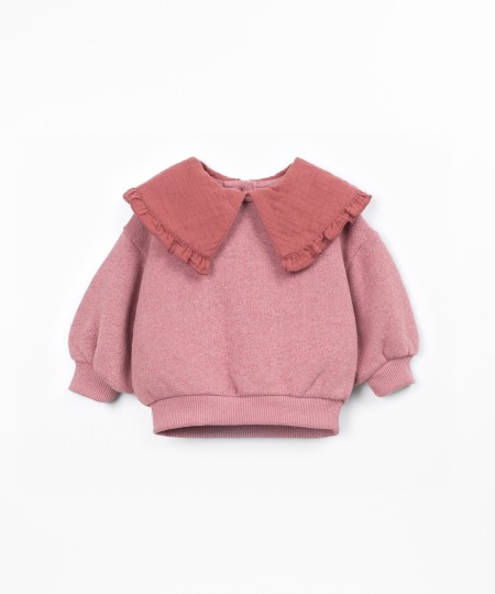 Sweater with a mix of natural and recycled fibers