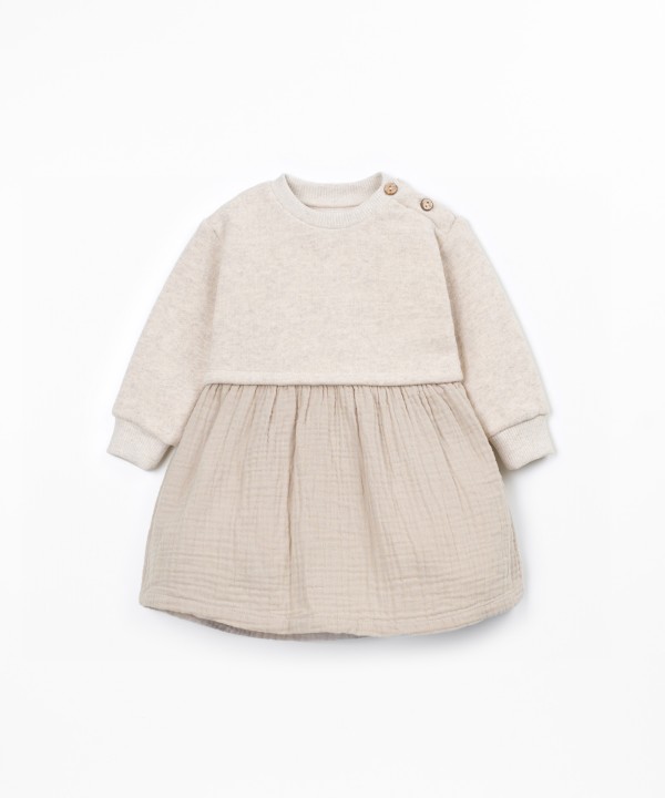 Dress with a mixture of knit and fabric