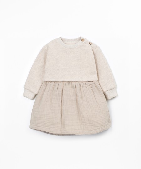 Dress with a mixture of knit and fabric