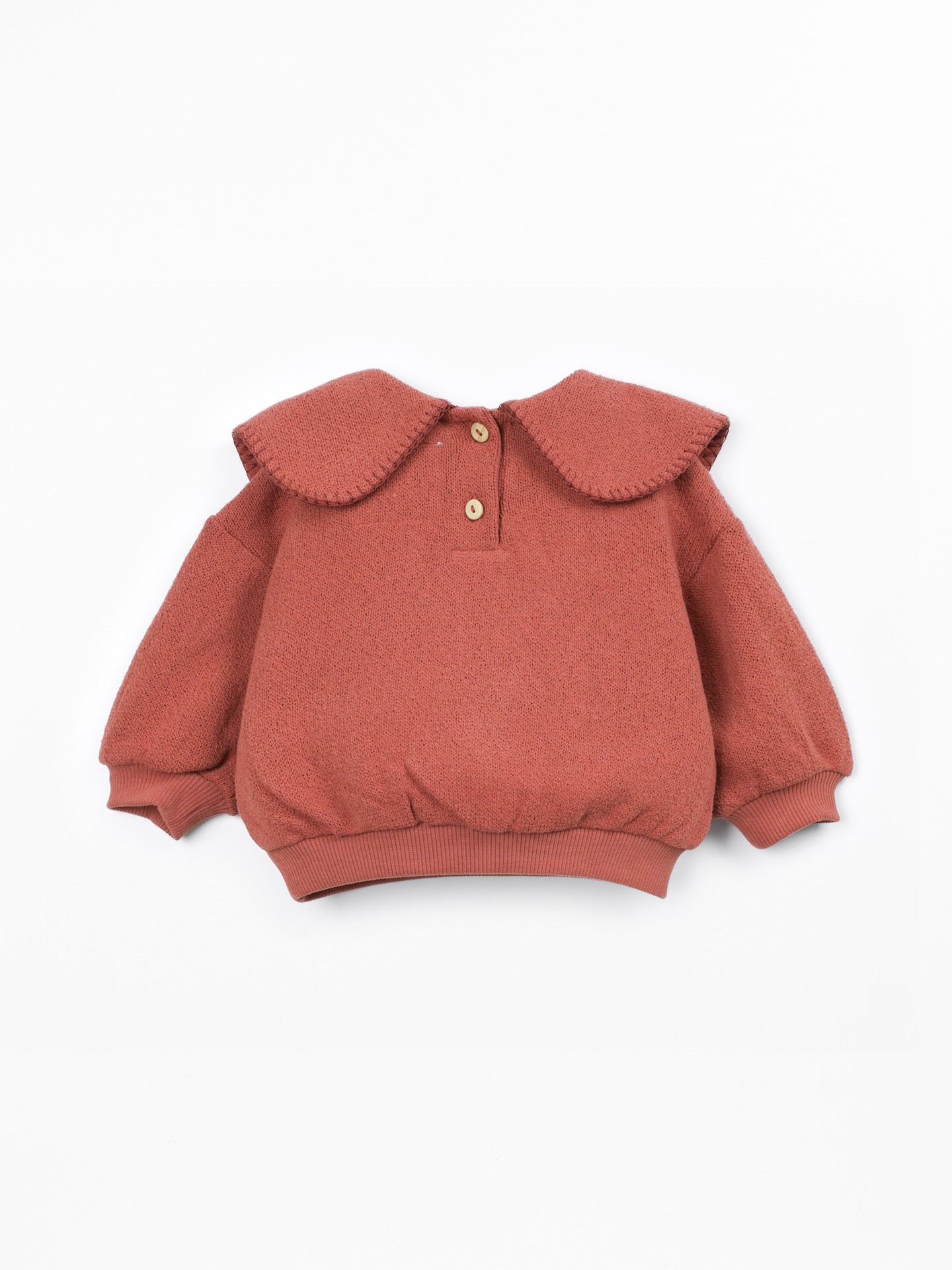 Knit sweater with recycled fibers