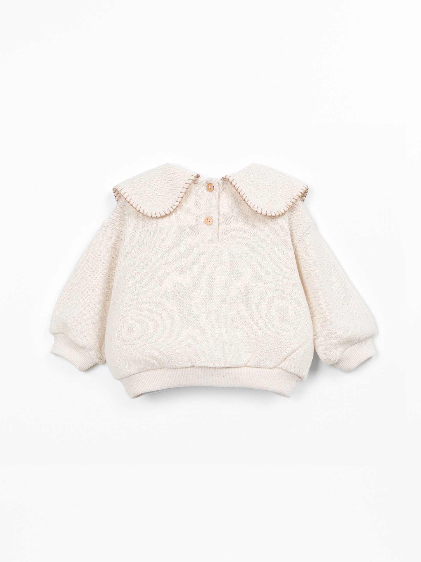 Knit sweater with recycled fibers