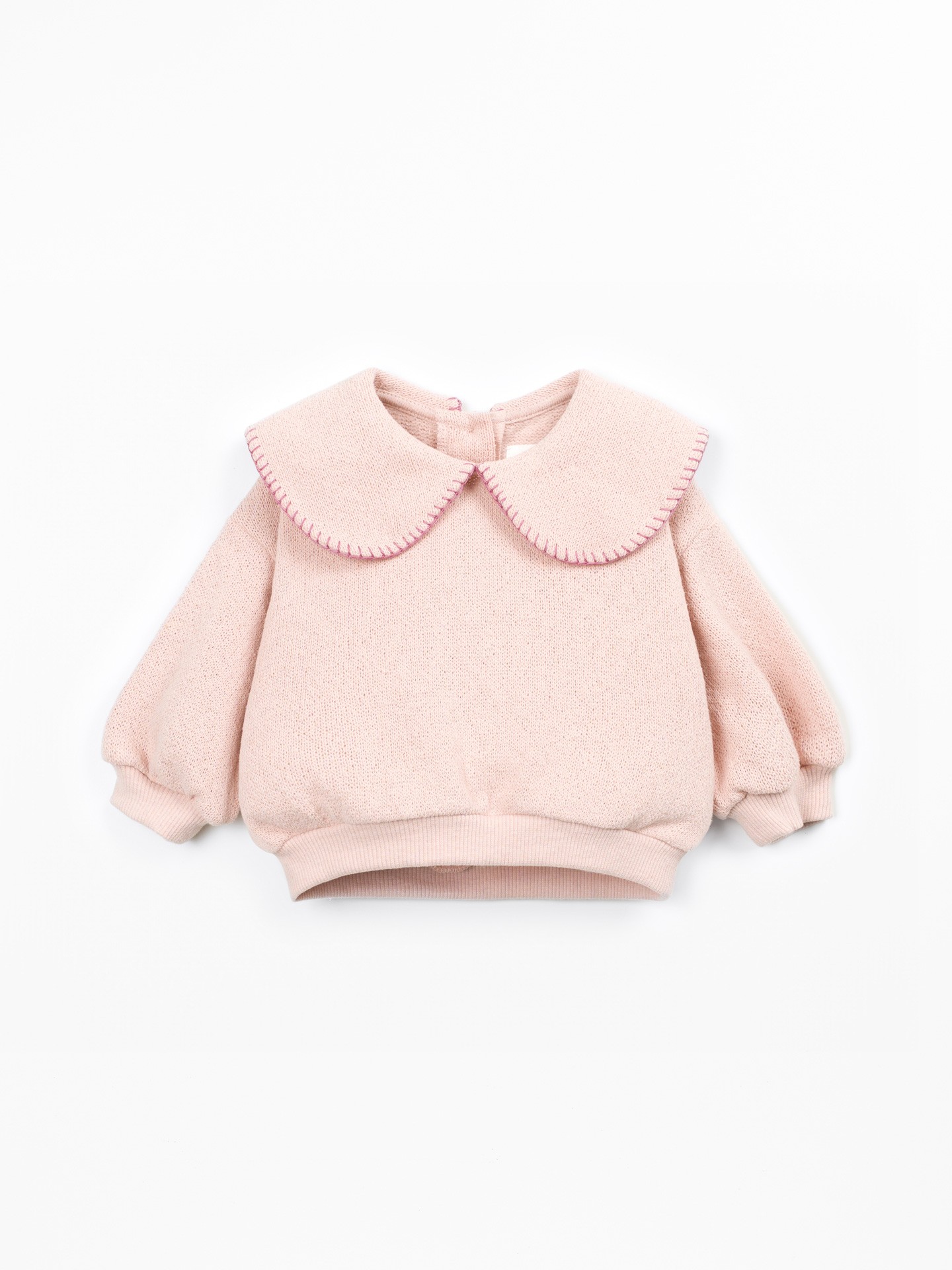 Knit sweater with recycled fibers