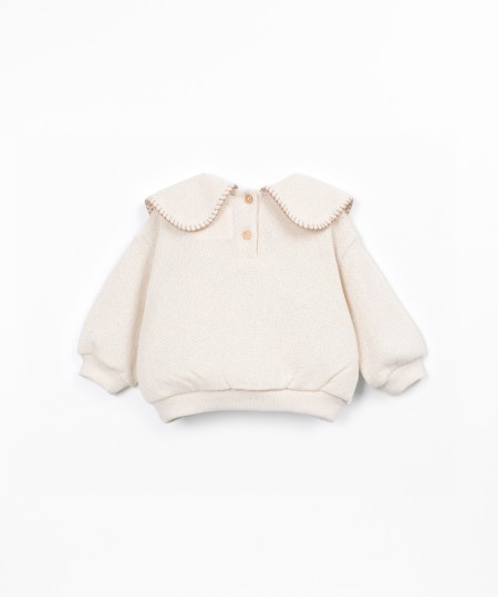 Pull en maille avec fibres recyclées