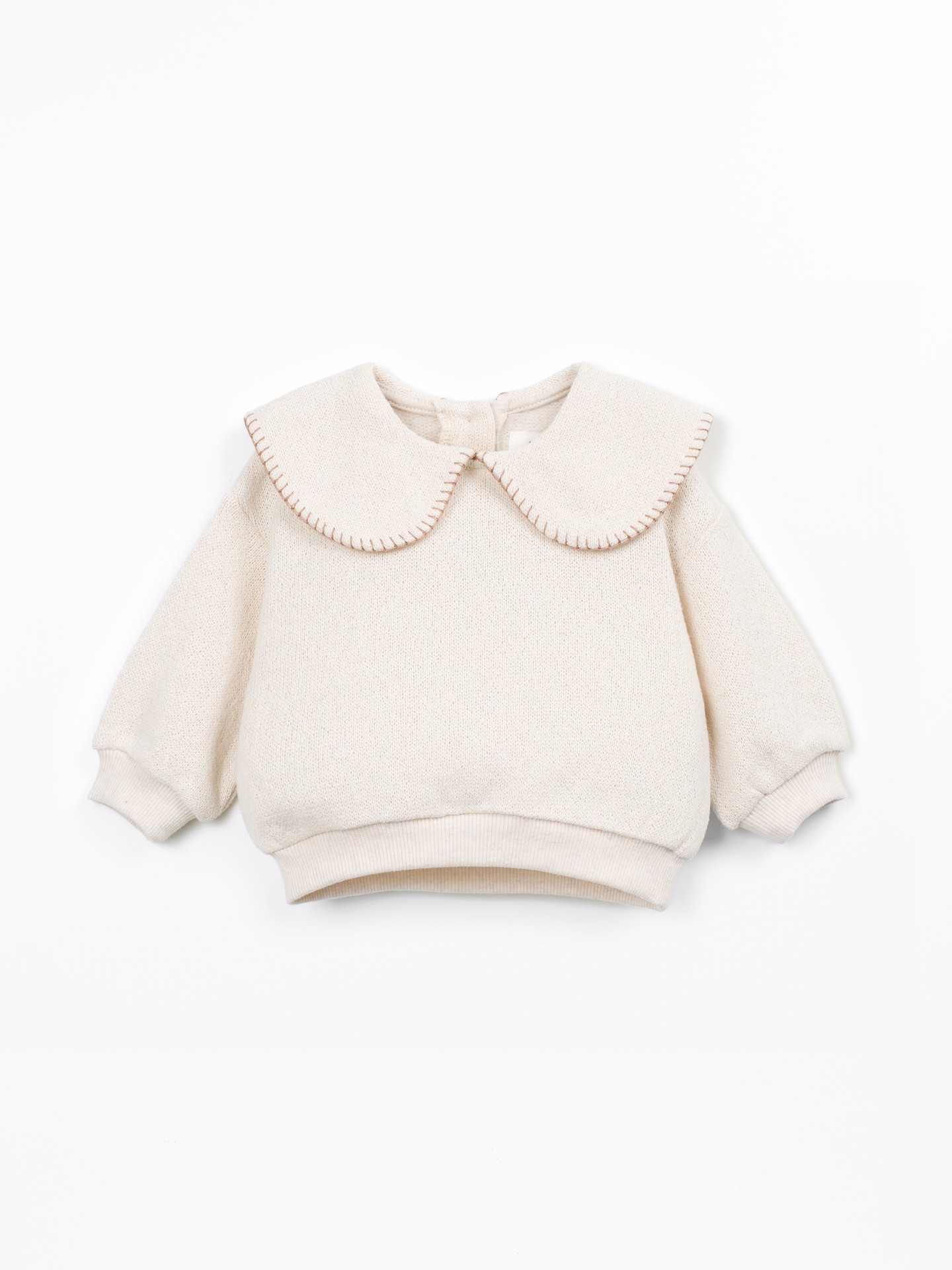 Knit sweater with recycled fibers