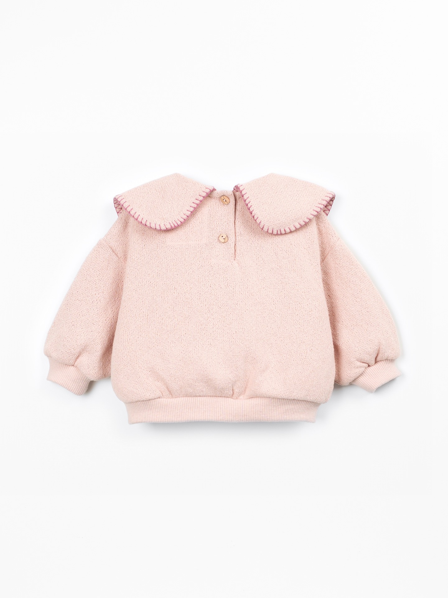 Knit sweater with recycled fibers