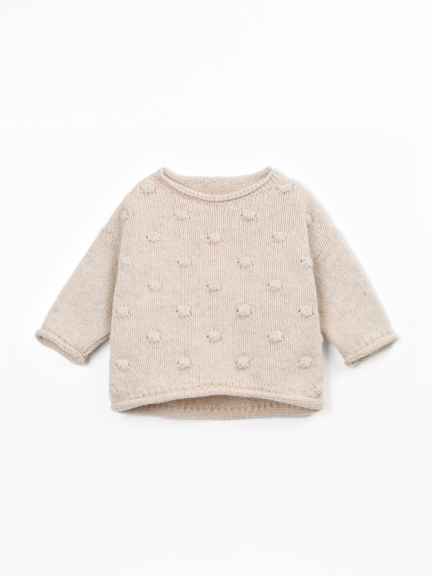 Pull tricoté avec dos plus long