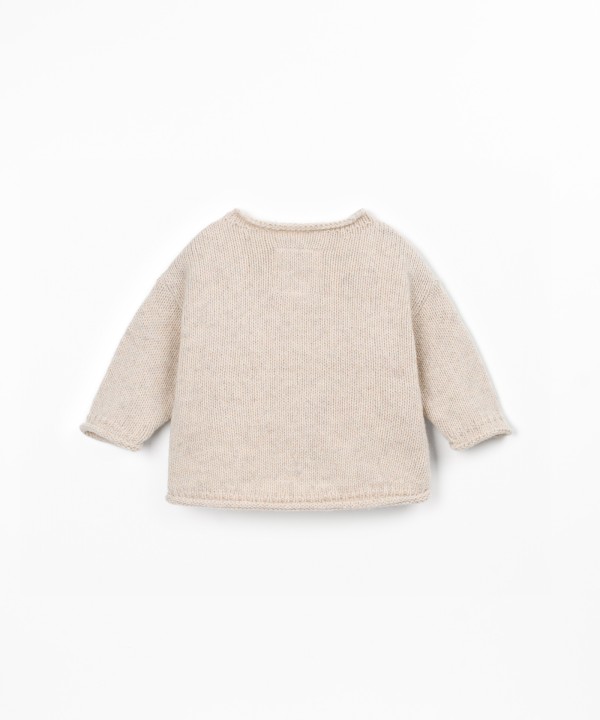 Pull tricoté avec dos plus long