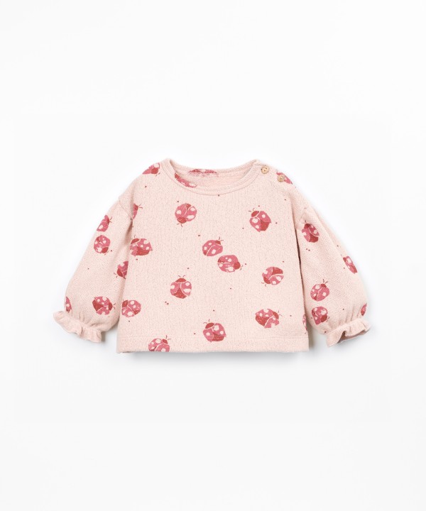 Knit sweater with a blend of cotton and recycled cotton