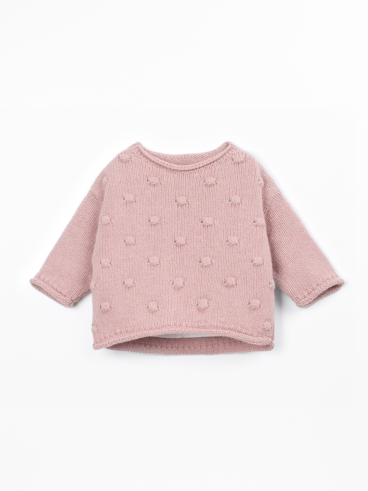 Pull en tricot avec dos plus long
