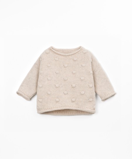 Pull tricot� avec dos plus long