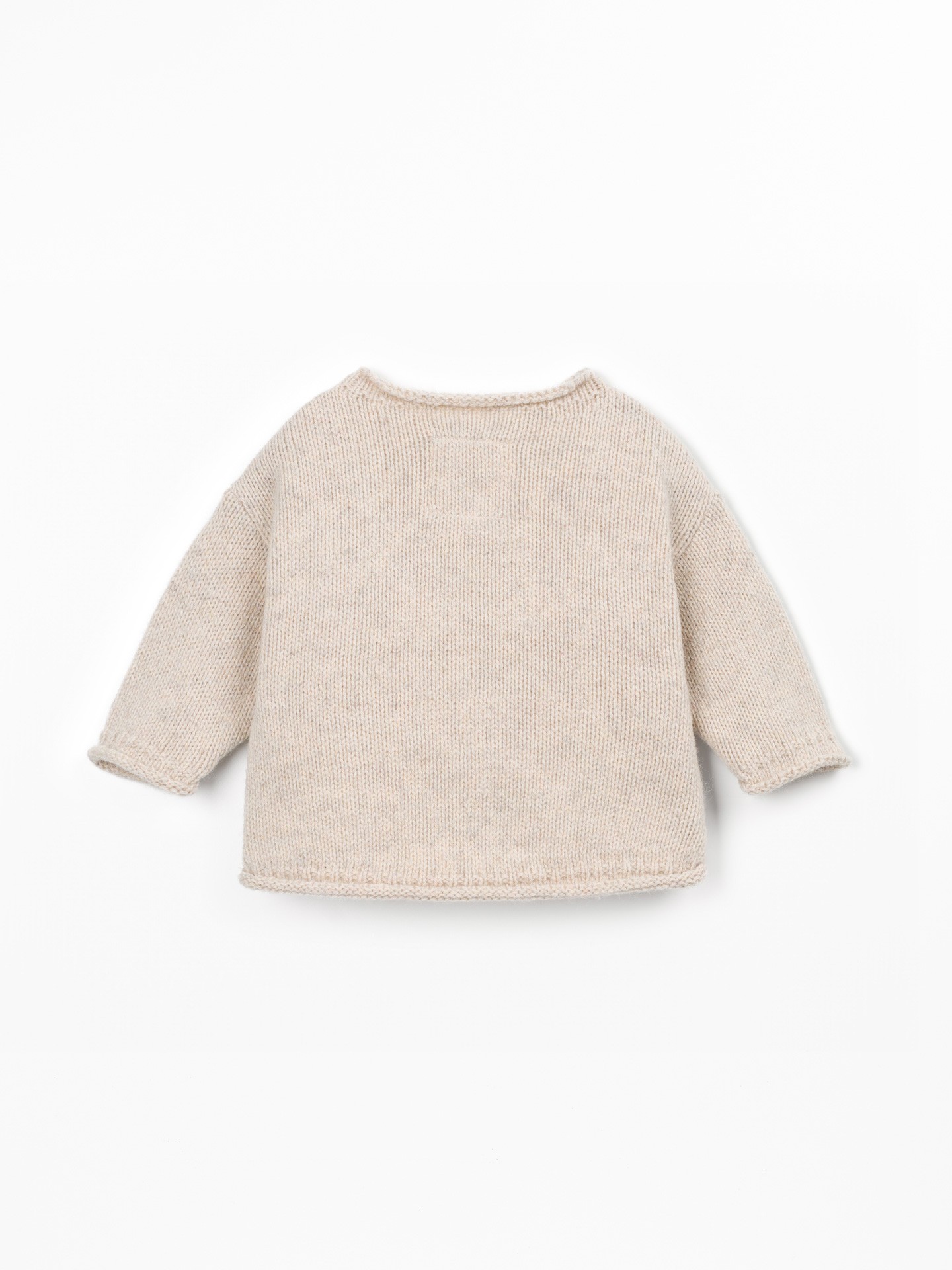 Pull tricoté avec dos plus long