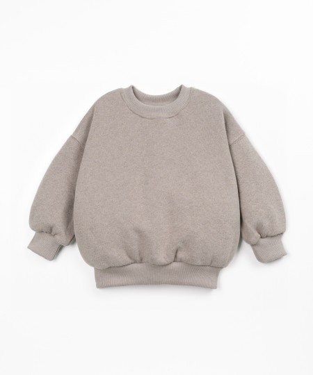 Sweater with a blend of cotton, recycled cotton, and recycled polyester