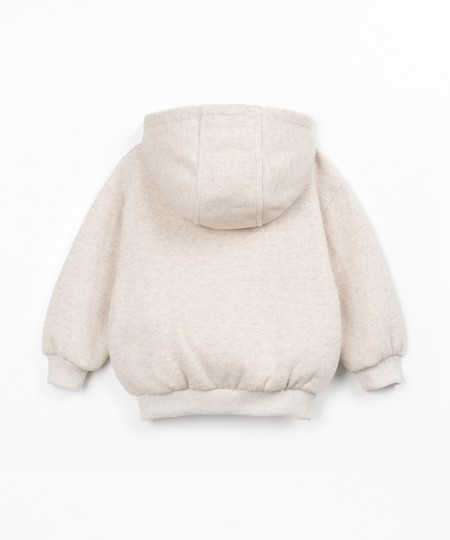 Veste en maille avec capuche et fermeture éclair