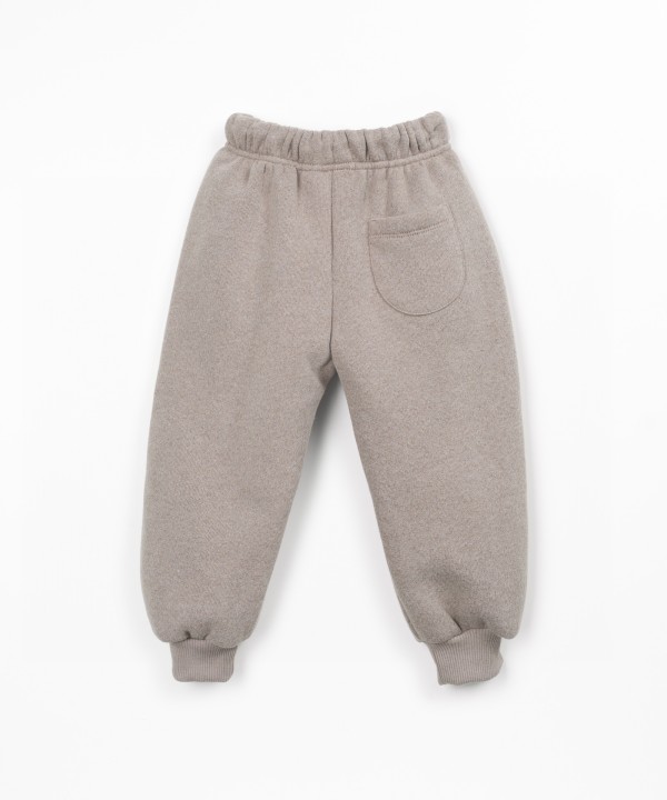 Trousers with a blend of cotton, recycled cotton, and recycled polyester