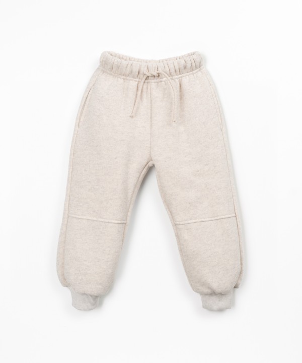 Pants with a blend of cotton, recycled cotton, and recycled polyester
