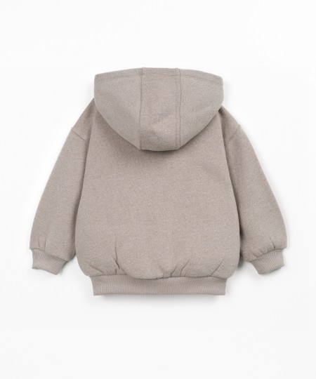 Veste en maille avec capuche et fermeture éclair