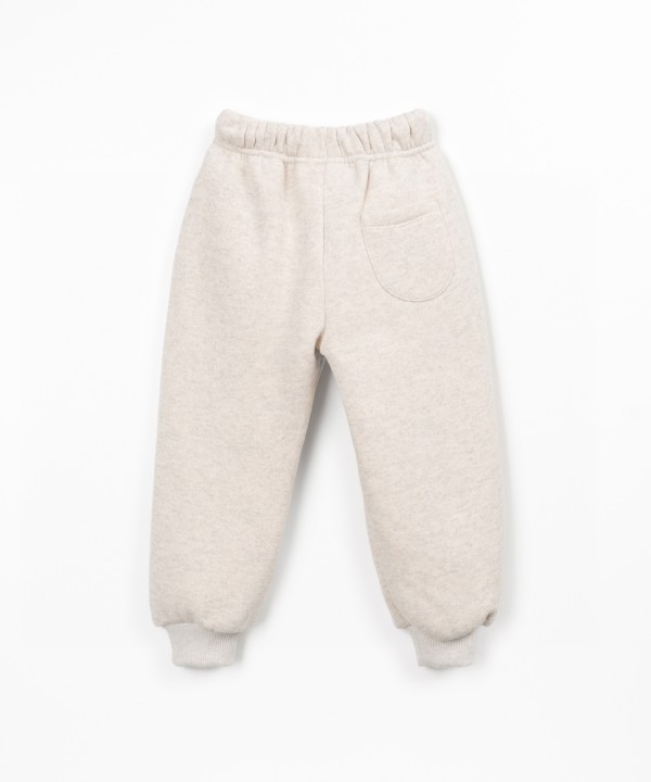 Pants with a blend of cotton, recycled cotton, and recycled polyester