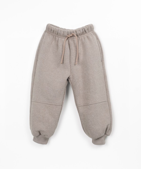 Trousers with a blend of cotton, recycled cotton, and recycled polyester