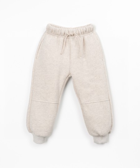 Pants with a blend of cotton, recycled cotton, and recycled polyester