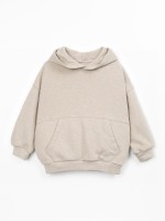 Knitted sweater in natural fibers
