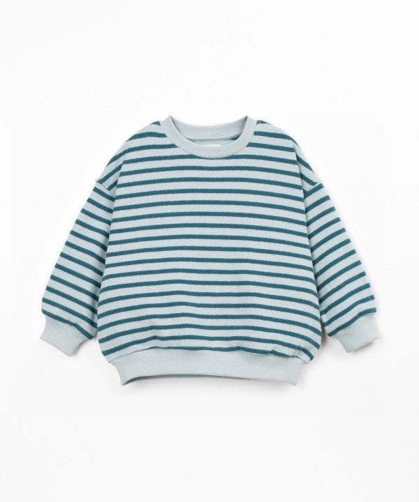 Knit sweater with a blend of cotton and recycled cotton