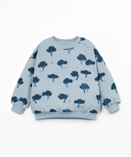Knit sweater with recycled fibers