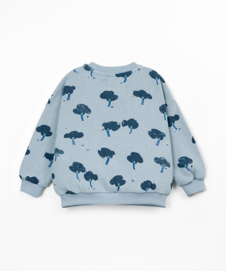 Knit sweater with recycled fibers