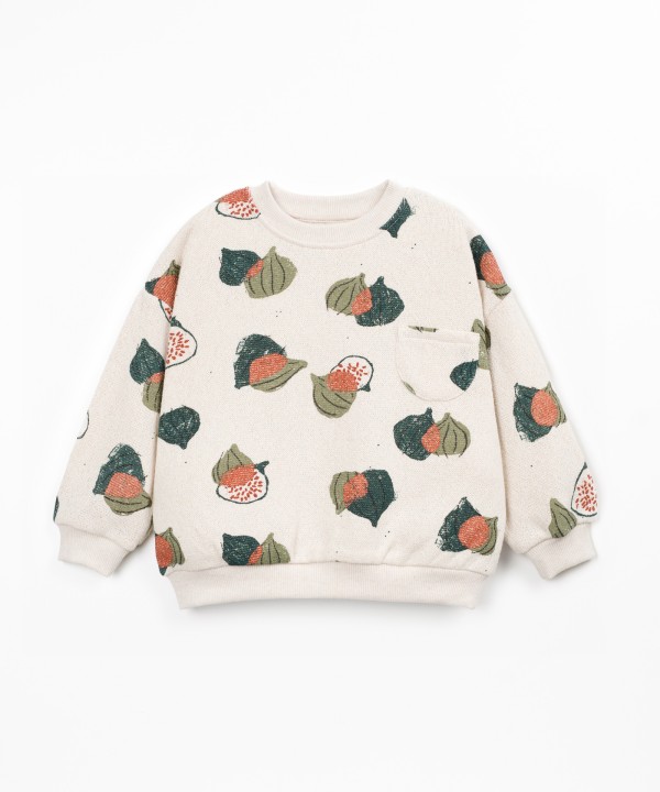 Knit sweater with recycled fibers