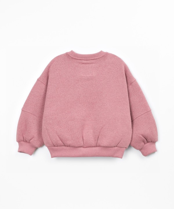 Sweater with a blend of cotton and recycled fibers