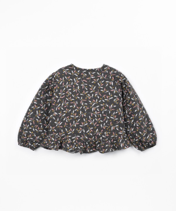 Woven blouse in natural fibers