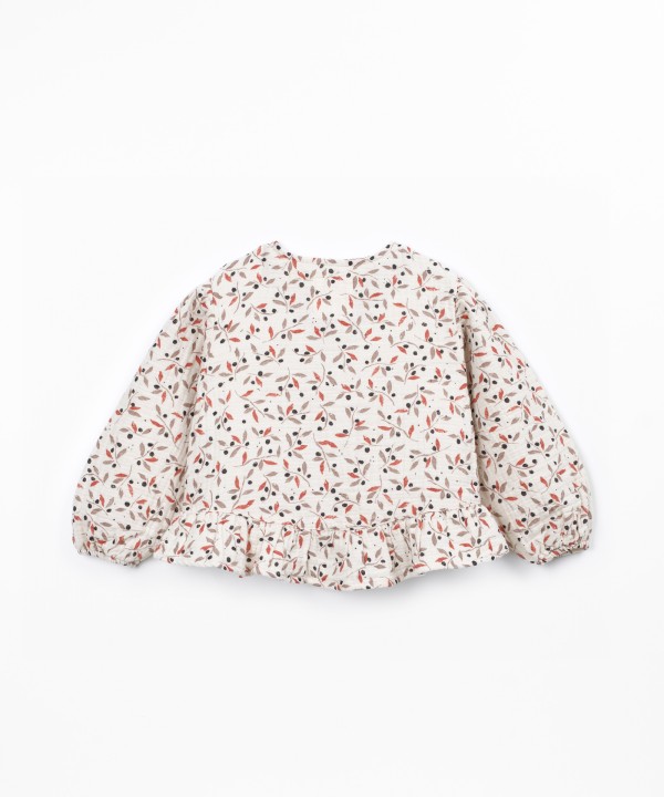 Woven blouse in natural fibers