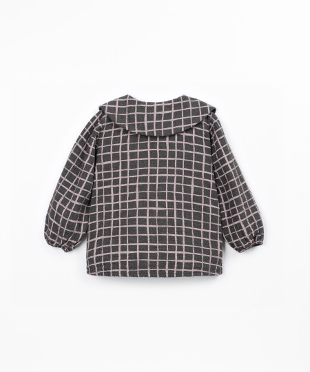 Blusa de tejido con estampado de cuadros