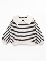 Knit sweater with a blend of cotton and recycled fibers