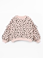 Knitted sweater with Re(Play) yarn