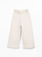 Knitted trousers with fibre blend