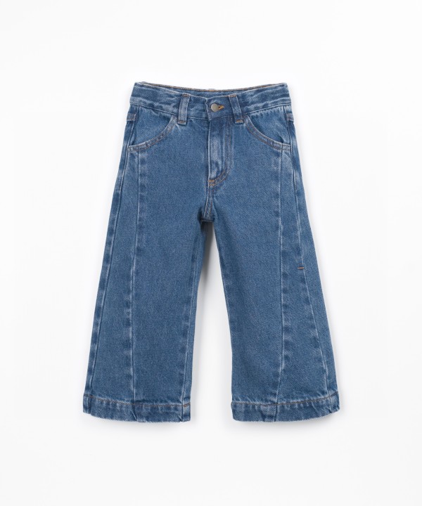 Denim trousers with adjustable waistband