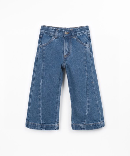 Denim trousers with adjustable waistband