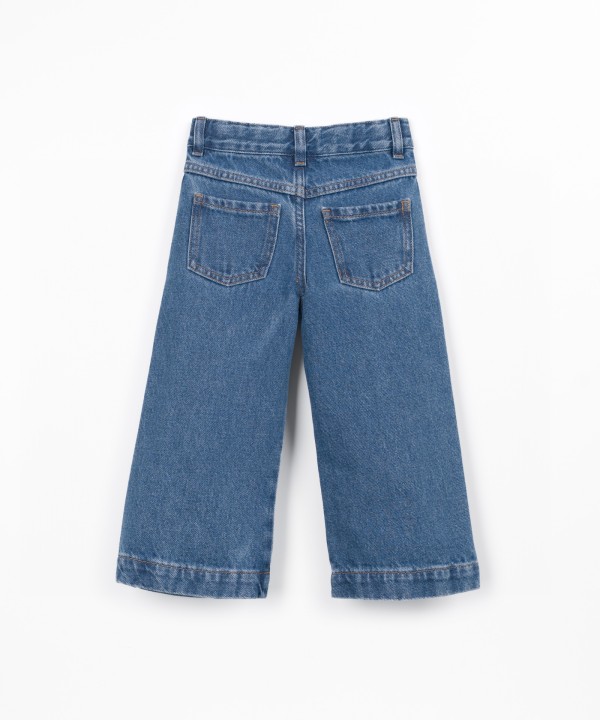 Denim trousers with adjustable waistband
