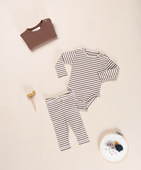 Striped leggings with decorative coconut buttons Striped leggings with decorative coconut buttons