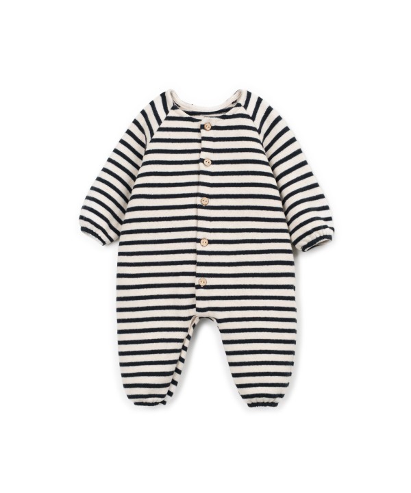 Knit jumpsuit with a mixture of natural and recycled fibers