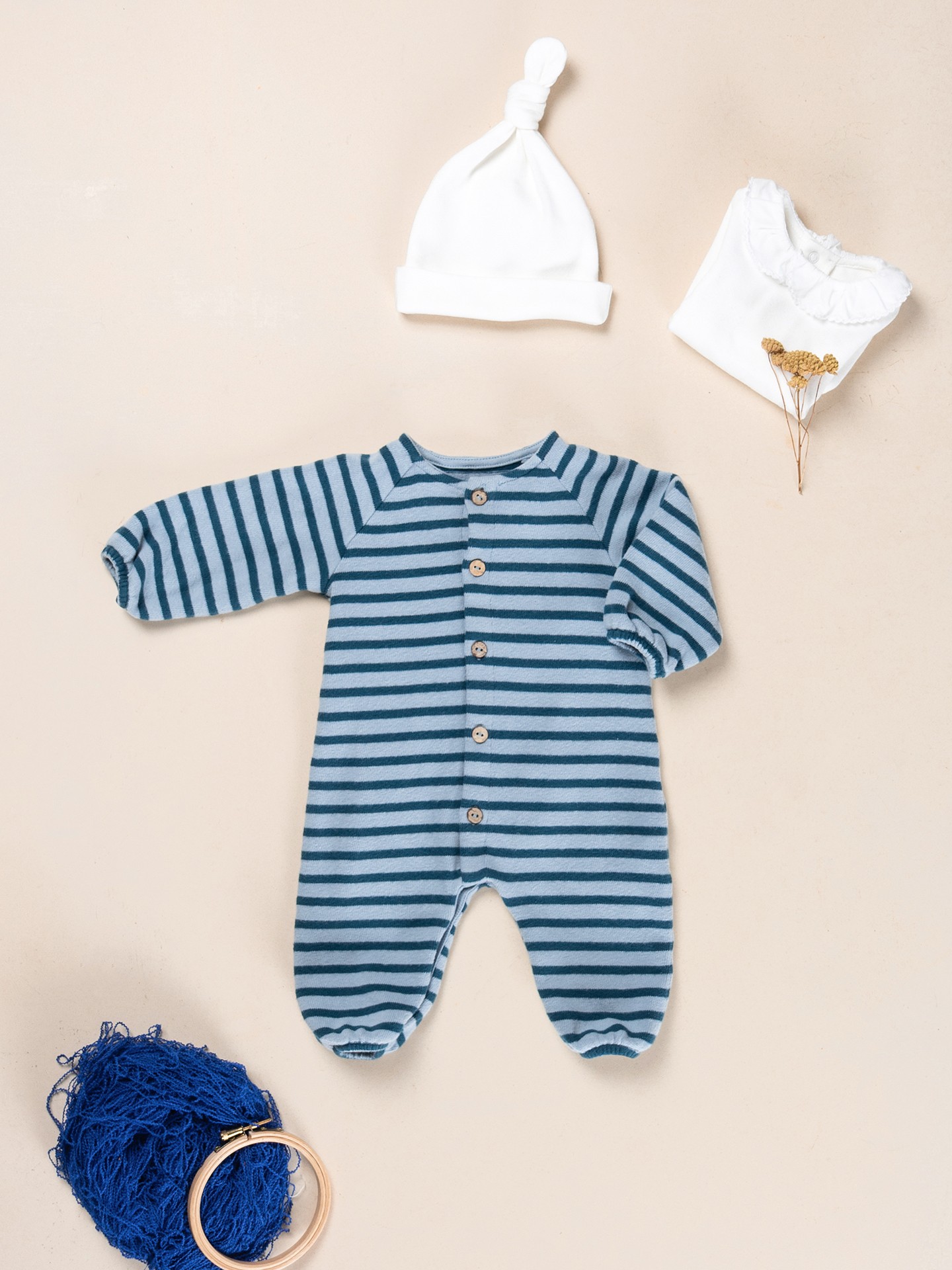 Knit jumpsuit with a mixture of natural and recycled fibers