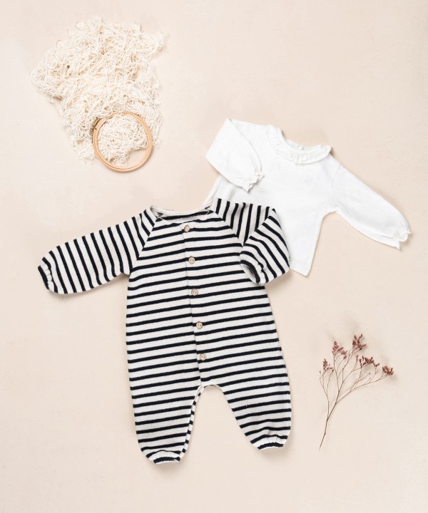 Knit jumpsuit with a mixture of natural and recycled fibers