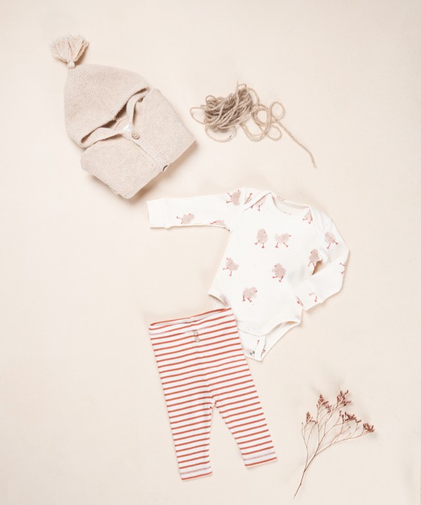 Leggings rayés avec boutons décoratifs en noix de coco