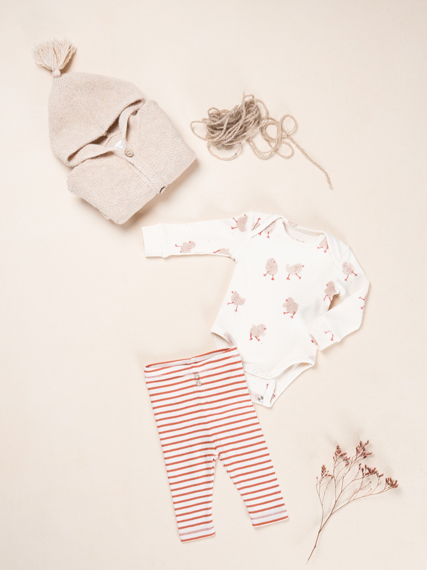 Leggings rayés avec boutons décoratifs en noix de coco