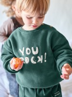 Knitted sweater with brushed interior
