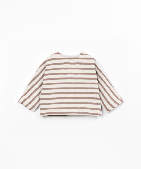 Knit sweater with a blend of natural fibers and recycled cotton