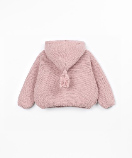 Knitted coat with front opening