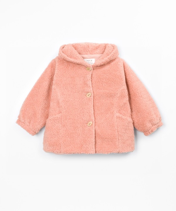 Veste en fourrure � capuche