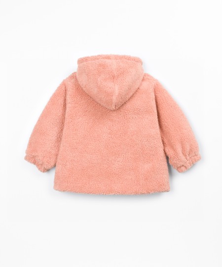 Veste en fourrure à capuche