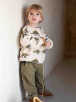 Knit sweater with shoulder opening